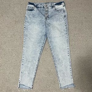 Button front skinny jeans